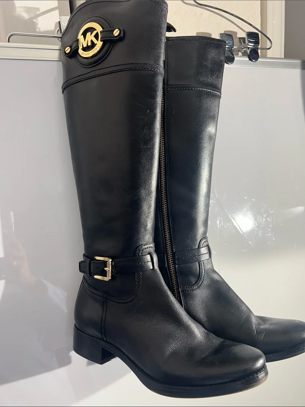 Knee-high leather boots with MK logo